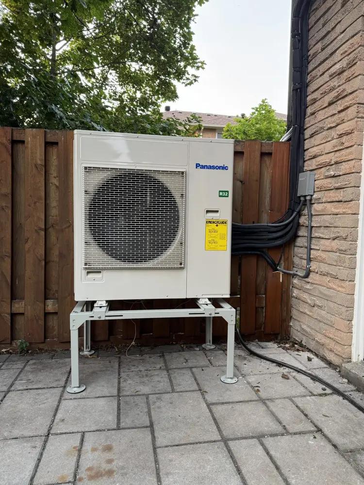 Panasonic multi-zone heat pump on a raised stand
